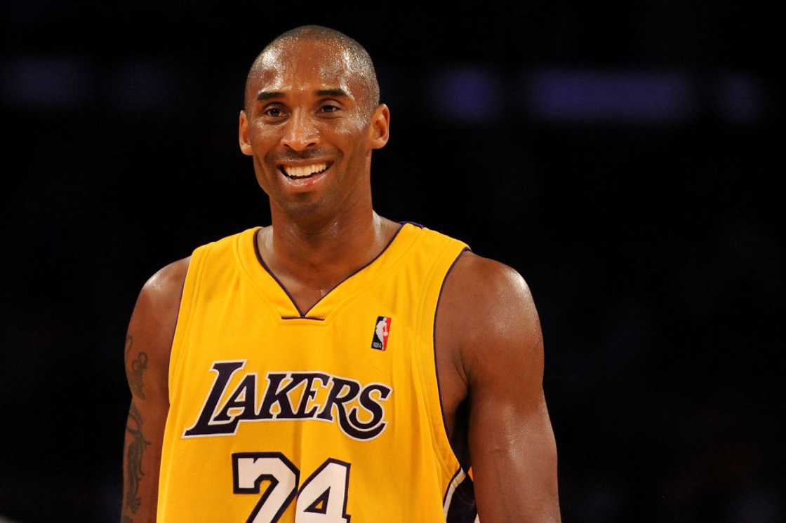 Kobe Bryant smiles in the fourth quarter during the game against the Chicago Bulls Kobe Bryant smiles in the fourth quarter during the game against the Chicago Bulls
