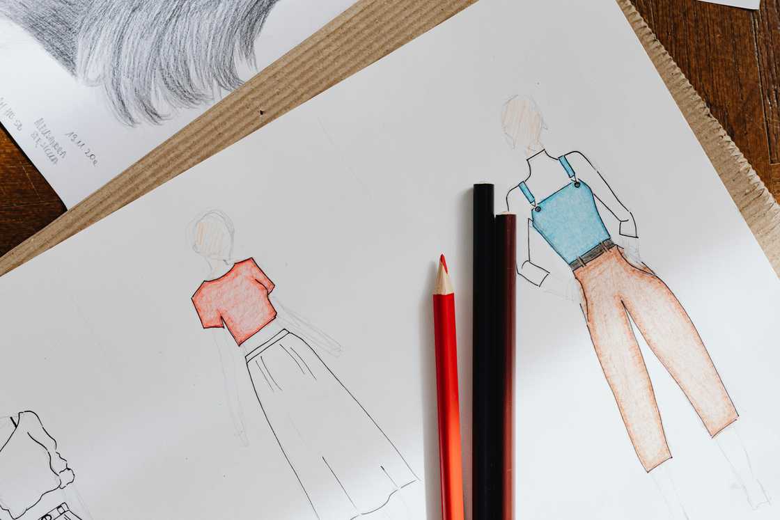 Sketches of clothes on a white paper Sketches of clothes on a white paper